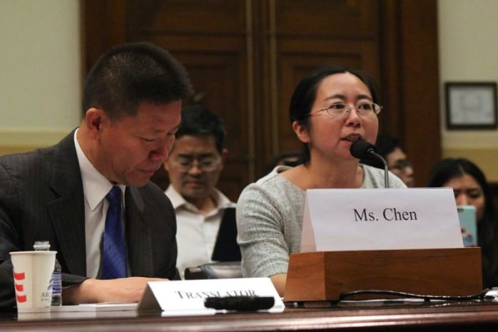 Chen Guiqiu, the wife of tortured human rights lawyer Xie Yang, speaks during a Congressional hearing in Washington, D.C. on May 18, 2017. The hearing also featured other wives of human rights lawyers imprisoned and tortured in China. Chen is flanked by her translator Bob Fu, founder of China Aid.