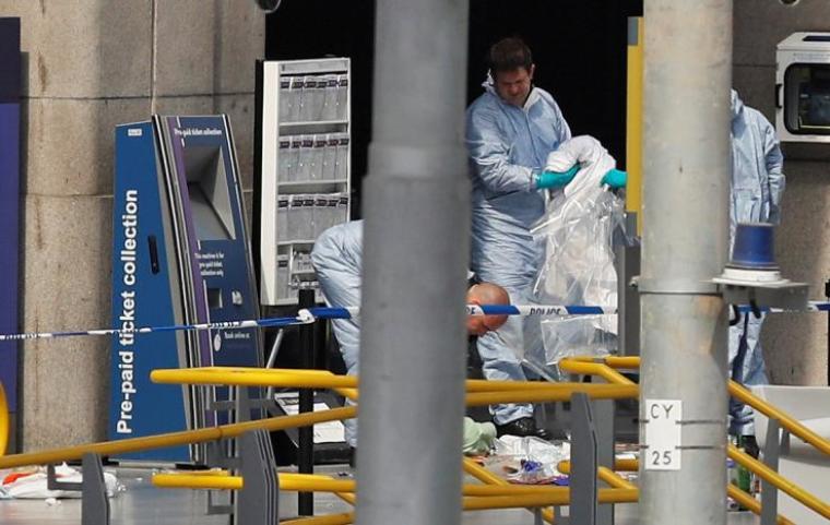 Forensics investigators work at the Manchester Arena in Manchester, Britain, May 23, 2017.