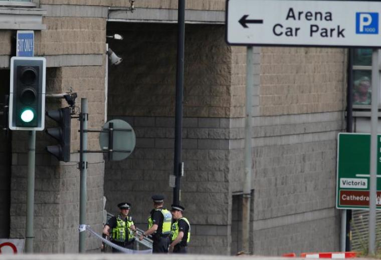 Police officer work behind the cordon near to the Manchester Arena, Britain, May 23, 2017.