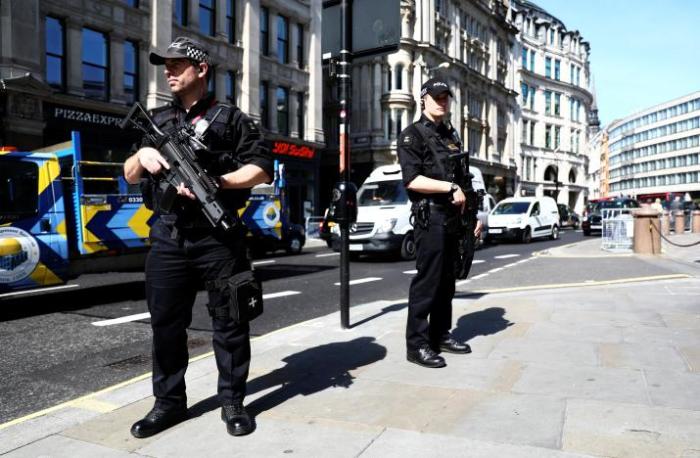 Armed police officers stand on duty outside St. Paul's Cathedral in London, Britain, May 24, 2017.