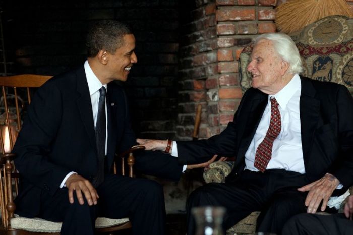 Former U.S. President Barack Obama visits Rev. Billy Graham in his home in North Carolina in 2010.