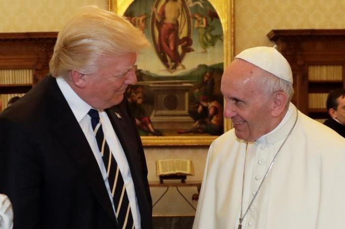 Pope Francis talks with U.S. President Donald Trump during a private audience at the Vatican, May 24, 2017.