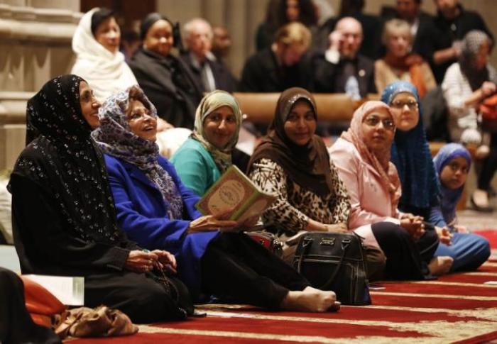The image features Muslim women at the Washington National Cathedral.
