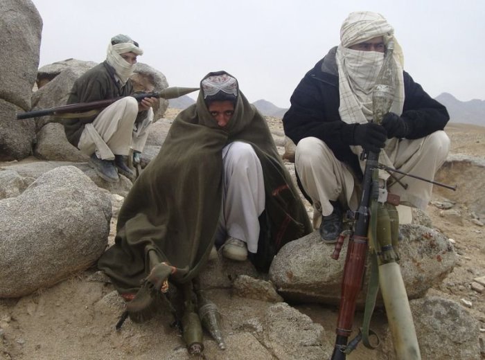 File photo of Taliban fighters posing with weapons in an undisclosed location in Afghanistan in this undated photo.