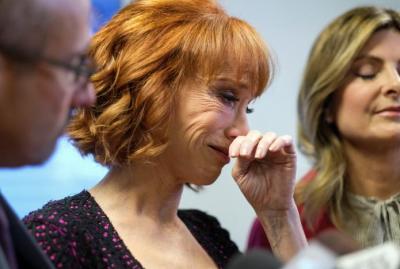 Comedian Kathy Griffin (C) cries during a news conference in Woodland Hills, Los Angeles, California, U.S., June 2, 2017.