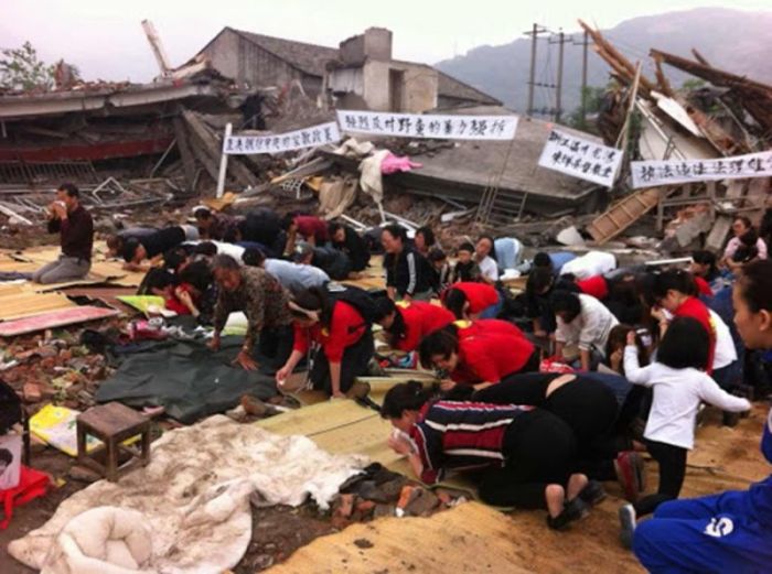 Christians worship in the rubble of their demolished church in China's central Henan province.