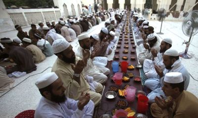 Men pray before breaking their fast on the first day of Ramadan, the holiest month in the Islamic calendar, at a mosque in Peshawar, Pakistan on June 29, 2014.