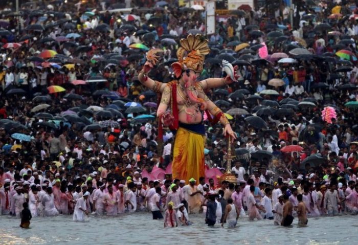 Devotees gather on the shores of the Arabian Sea to immerse idols of the Hindu god Ganesh, the deity of prosperity, on the last day of the ten-day-long Ganesh Chaturthi festiva in Mumbai, India, in September 2016.