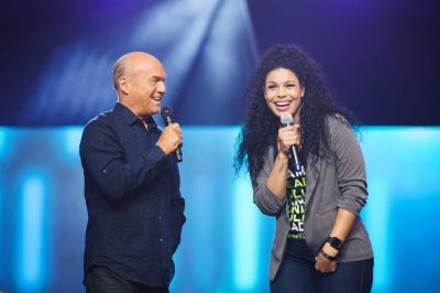 Pastor Greg Laurie and Jordin Sparks talk on stage at Harvest America at the University of Phoenix Stadium on June 11, 2017.