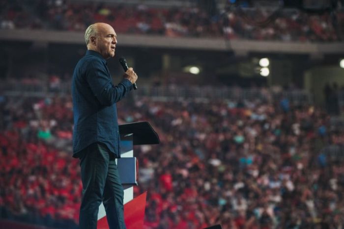 Pastor Greg Laurie preaches at Harvest America at the University of Phoenix Stadium on June 11, 2017.