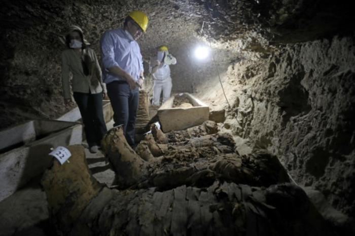 Egyptian Minister of Antiquities Khaled Al-Anani inside a newly discovered burial site in Minya, Egypt May 13, 2017.