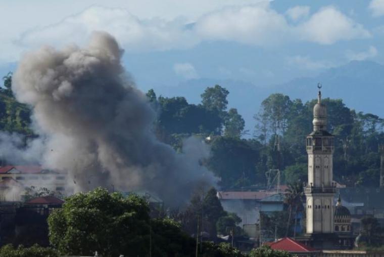 An explosion is seen after Philippines army airstrike as government troops continue their assault against insurgents from the Maute group in Marawi City, Philippines, June 28, 2017.