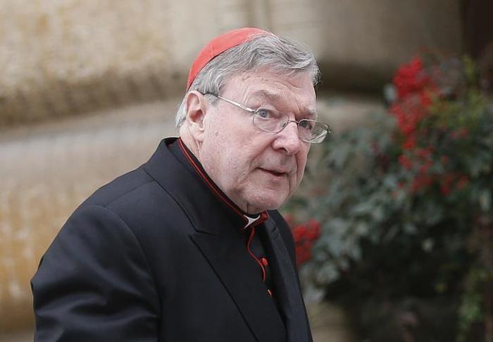 Australian Cardinal George Pell arrives for a meeting at the Synod Hall in the Vatican March 6, 2013.