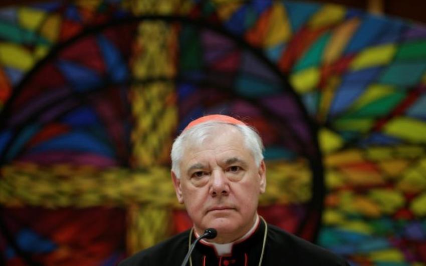 Newly elected cardinal Gerhard Ludwig Muller of Germany smiles as he holds a news conference to unveil his book "Poor for the Poor: The Mission of the Church," with the preface written by Pope Francis, in downtown Rome, Italy, February 25, 2014.