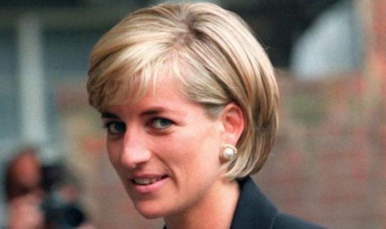 Princess Diana arrives at the Royal Geographical Society in London for a speech on the dangers of landmines throughout the world on June 12, 1997.
