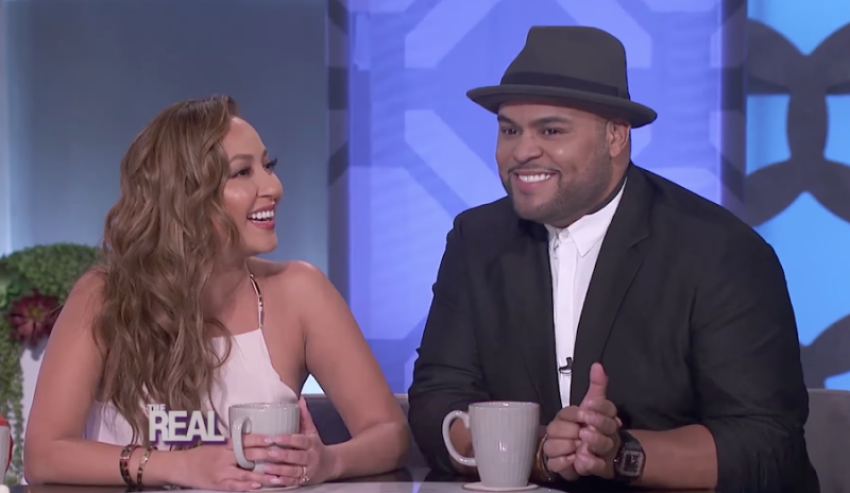 Adrienne and Israel Houghton talk on "The Real" in 2016.