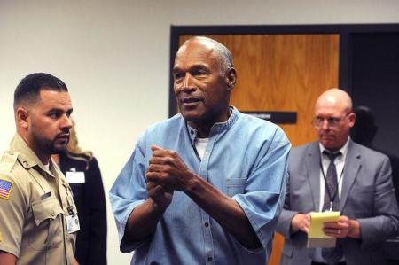 O.J. Simpson (center) reacts during his parole hearing at Lovelock Correctional Centre in Lovelock, Nevada, U.S. July 20, 2017.