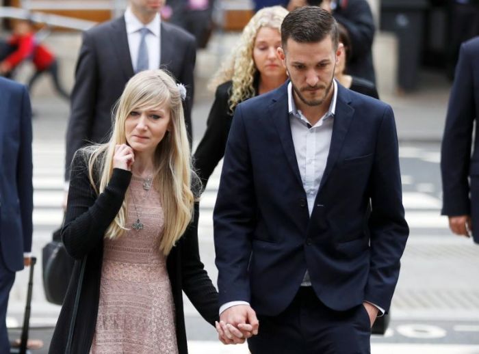Charlie Gard's parents Coonie Yates and Chris Gard arrive at the High Court ahead of a hearing on their baby's future, in London, Britain July 24, 2017.