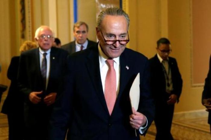 Credit : U.S. Senate Minority Leader Chuck Schumer (D-NY) arrives to talk to the media on the president's FY2018 budget proposal, June 25, 2017.