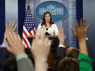 Sarah Huckabee Sanders answers reporters' questions at a White House press briefing on May 11.