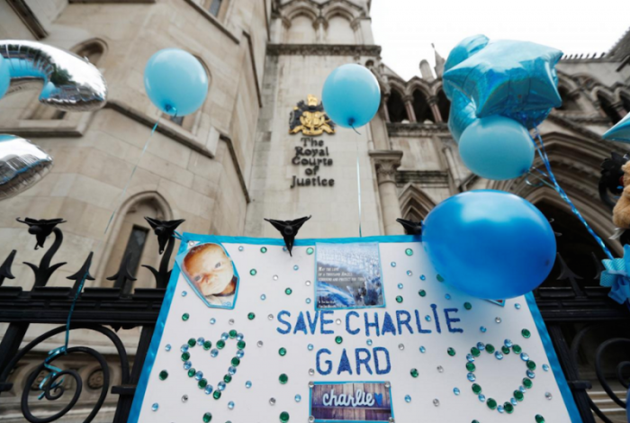 Balloons and messages for Charlie Gard and his parents are attached to the railings outside the High Court ahead of a hearing on the baby's future, in London, Britain July 24, 2017.