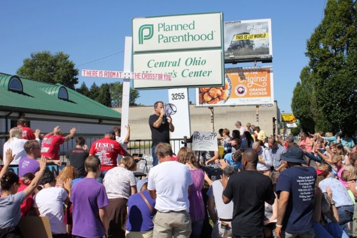 The pro-life activist group Created Equal holding a demonstration outside of a Planned Parenthood clinic in Ohio.