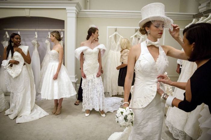 Models prepare for the 11th annual toilet paper wedding dress contest, at Kleinfeld's Bridal Boutique, in New York.