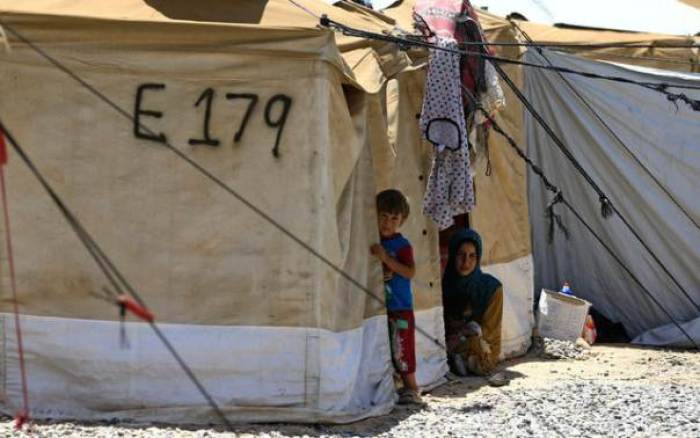 Displaced children who fled their homes are seen at Salamiyah camp, near Mosul, Iraq July 26, 2017.
