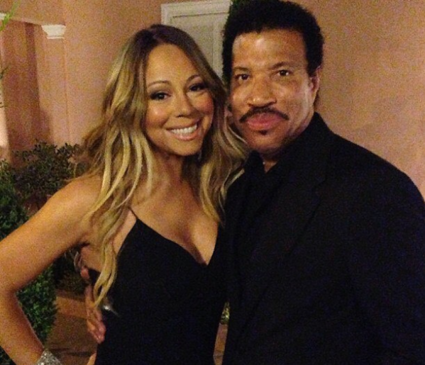 Lionel Richie poses with Mariah Carey as they venture out for "All The Hits Tour," December 15, 2016.