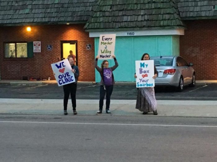Demonstrators hold signs outside of the Capital Care Network of Toledo abortion clinic in a photo posted to Facebook on October 9, 2016.