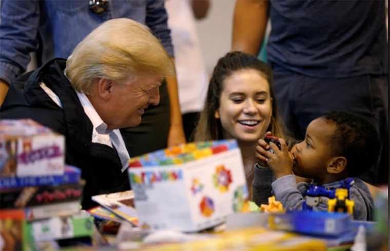 U.S. President Donald Trump visits with survivors of Hurricane Harvey at a relief center in Houston, Texas, September 2, 2017.