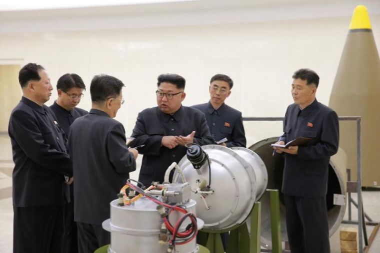 North Korean leader Kim Jong Un provides guidance on a nuclear weapons program in this undated photo released by North Korea's Korean Central News Agency in Pyongyang, September 3, 2017.