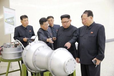 North Korean President Kim Jong Un provides guidance on a nuclear weapons program in this undated photo released by Korean Central News Agency, September 3, 2017.