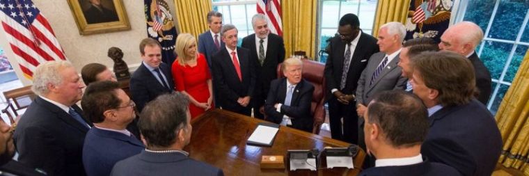 U.S. President Donald Trump meets with Christian leaders at the Oval Office after Hurricane Harvey hit the Texas Gulf Coast and Louisiana to announce a National Day of Prayer for survivors and the nation in Washington, D.C. on September 1, 2017.