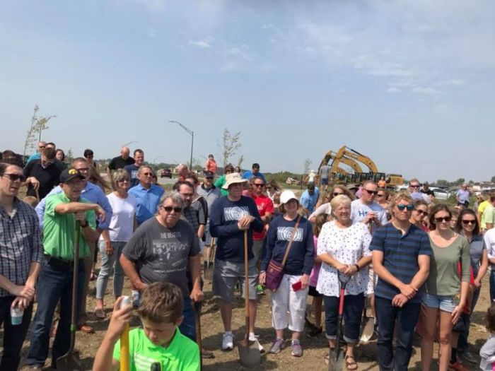 Members of the Johnston-Grimes campus of Lutheran Church of Hope break ground in September 2017 at the site for their new worship space.