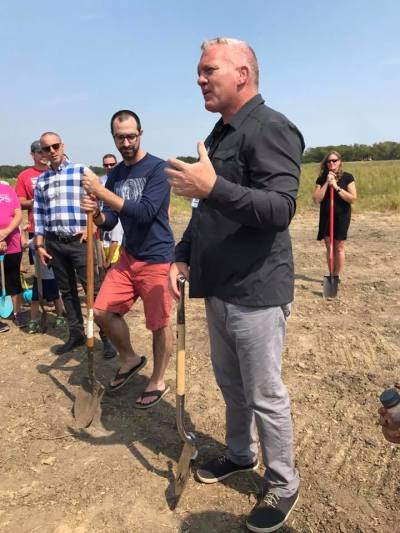 Eric Voelker, pastor for the Johnston-Grimes Campus of Lutheran Church of Hope, gives remarks at the ground-breaking for the new worship facility in Grimes, Iowa on Sept. 10, 2017.