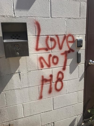 Vandals spray-painted red graffiti LGBT messages on Cornerstone Community Church, the Cavalier Theater, Sequel Resale Shop and Credit Bureau Data, in La Crosse, Wisconsin, on September 9, 2017.