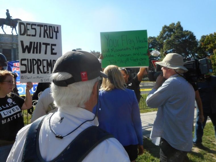 A group of counter-protesters gather in Richmond, Virginia against a Tennessee-based Confederate heritage group holding a rally in support of a Robert E. Lee statue on Monument Avenue.