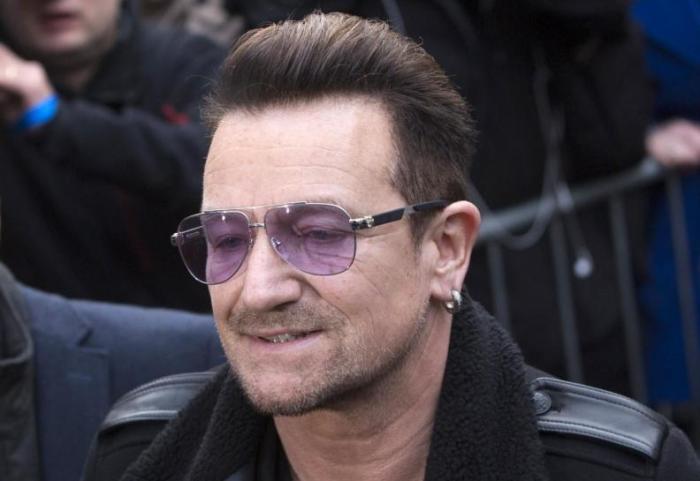 U2 lead singer Bono arrives for the recording of the Band Aid 30 charity single in west London November 15, 2014.