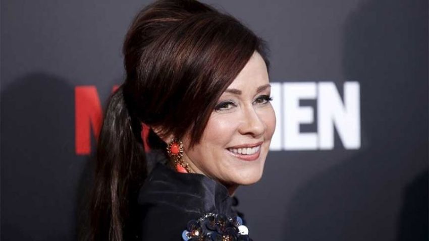 Actress Patricia Heaton poses at the "Mad Men" Black and Red Ball to celebrate the final seven episodes of the AMC television series in Los Angeles Wednesday, March 25, 2015.