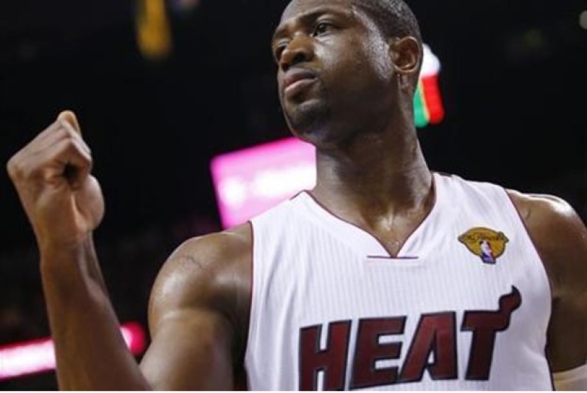 Dwyane Wade reacts to the play in his game against the Oklahoma City Thunder in the first half during Game 3 of the NBA basketball finals in Miami, Florida, June 17, 2012.