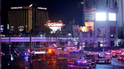 Las Vegas Metro Police and medical workers stage in the intersection of Tropicana Avenue and Las Vegas Boulevard South.