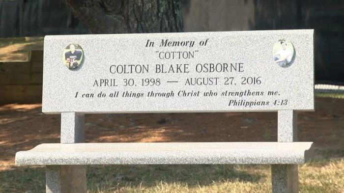 A memorial bench sits outside of the Randolph Henry High School in Charlotte Court House, Virginia in honor of fallen graduate Colton Osborn.