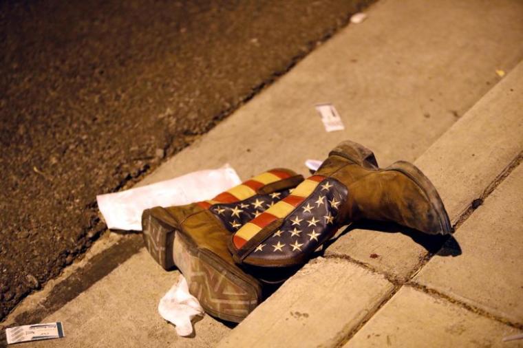 A pair of cowboy boots is shown in the street outside the concert venue in Las Vegas on October 1, 2017.