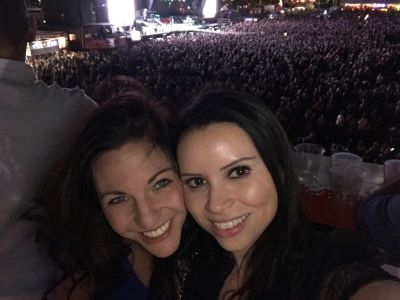 Carolina Salaberrios (right) and her friend attend the Route 91 Harvest music festival in Las Vegas, Oct. 1, 2017, where a gunman killed at least 59 people and injured over 500 others.