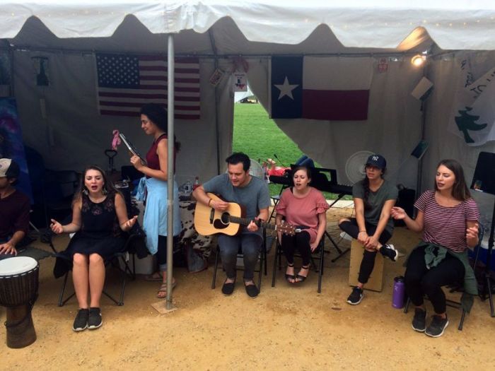 Christians sing and worship at the Texas tent, one of 58 tents set up at the National Mall during America's Tent of Meeting sponsored by Awaken the Dawn, Washington, D.C. on October 8, 2017.
