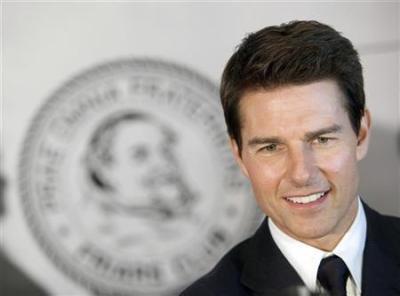 Actor Tom Cruise arrives before The Friars Club and Friars Foundation honored him with the Entertainment Icon Award at the Waldorf Astoria in New York June 12, 2012.