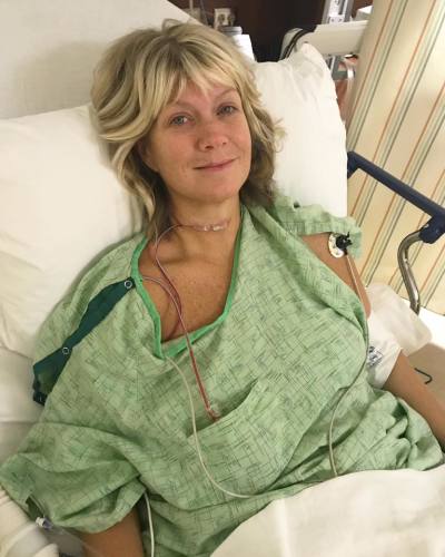 Natalie Grant sits in hospital bed after undergoing thyroid surgery, Oct 10, 2017.