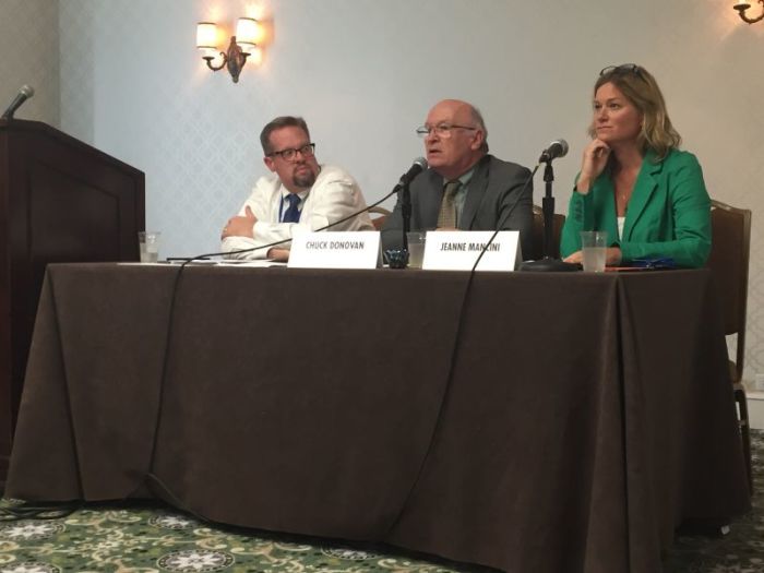 Charlotte Lozier Institute President Chuck Donovan (M) speaks during a panel discussion at the Family Research Council's Values Voters Summit at the Omni Shoreham in Washington,D.C. on Oct. 14, 2017. He is flanked by Union University professor Hunter Baker (L) and March for Life President Jeanne Mancini (R).