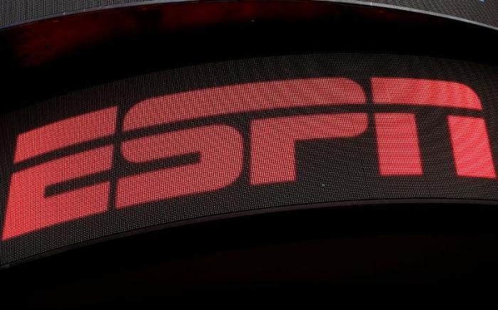 The ESPN logo is seen on an electronic display in Times Square in New York City, U.S., August 23, 2017.